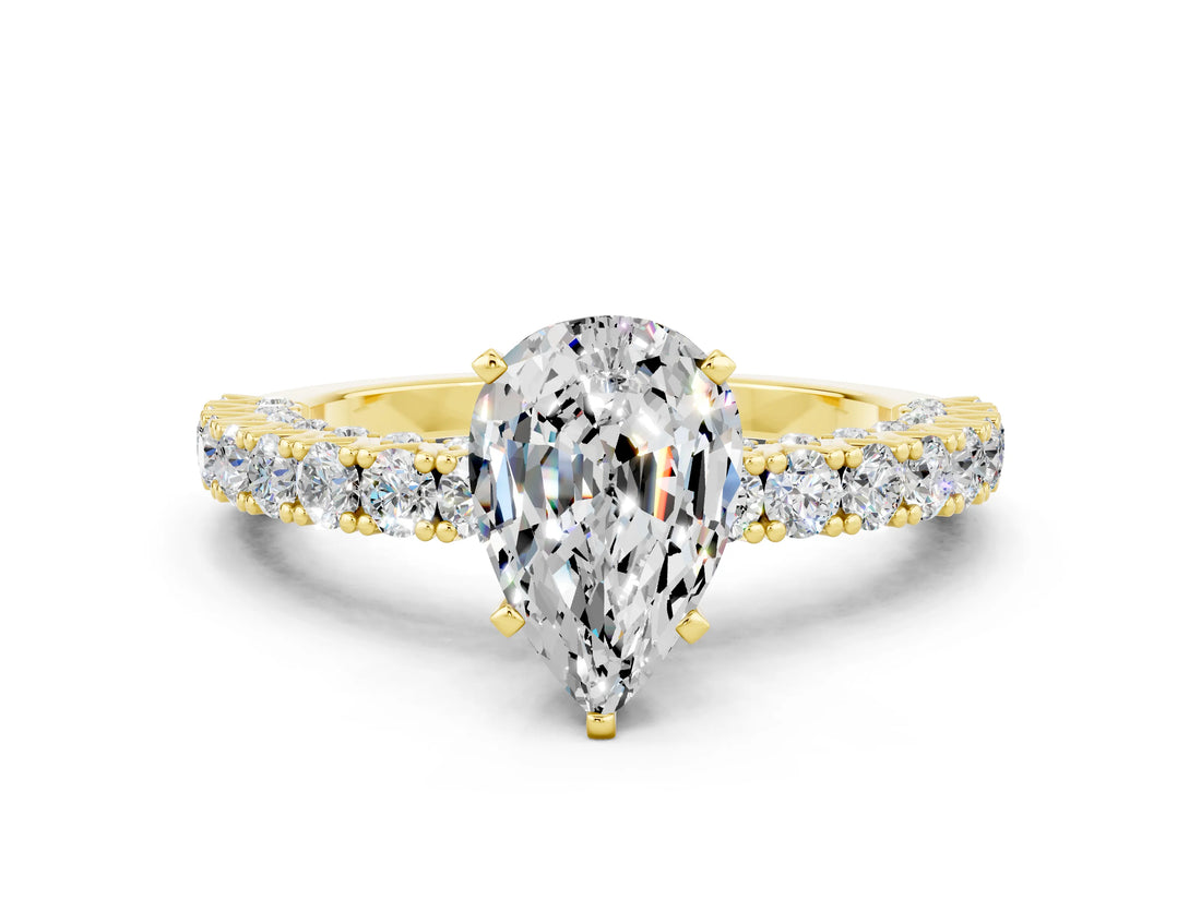 Yellow gold Pear Cut Diamond Pavé Band Solitaire Ring with Prong Setting