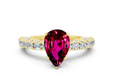 Yellow gold Pear Cut Diamond Pavé Band Solitaire Ring with Prong Setting