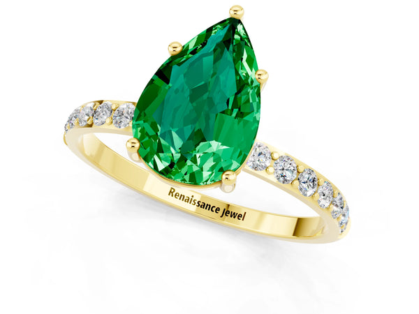 Yellow gold Pear Cut Emerald Solitaire Ring with Round Pavé Shoulders and Prong Setting