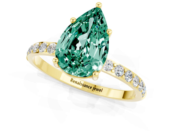 Yellow gold Pear Cut Green Sapphire Solitaire Ring with Round Pavé Shoulders and Prong Setting
