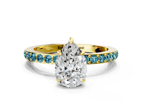 Yellow gold Pear Cut Diamond Pavé Engagement Ring with Round with Blue Topaz side stone Accents and Prong Setting