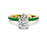 Yellow gold Pear Cut Diamond Pave Band Solitaire Ring with Round with Emerald side stone and Prong Setting