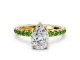 Yellow gold Pear Cut Diamond Pave Band Solitaire Ring with Round with Peridot side stone and Prong Setting
