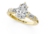 Yellow gold Pear Cut Diamond Ring with Baguette Side Stones, Channel Set Band, and Four-Prong Setting_26
