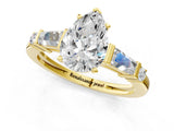 Yellow gold Pear Cut Diamond Ring with Baguette Side Stones, Channel Set Band, and Four-Prong Setting_26
