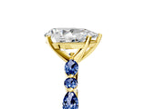 Yellow gold Pear Cut Diamond Ring with Marquise and Round with Blue Sapphire side stone Side Stones and Four-Prong Setting_53