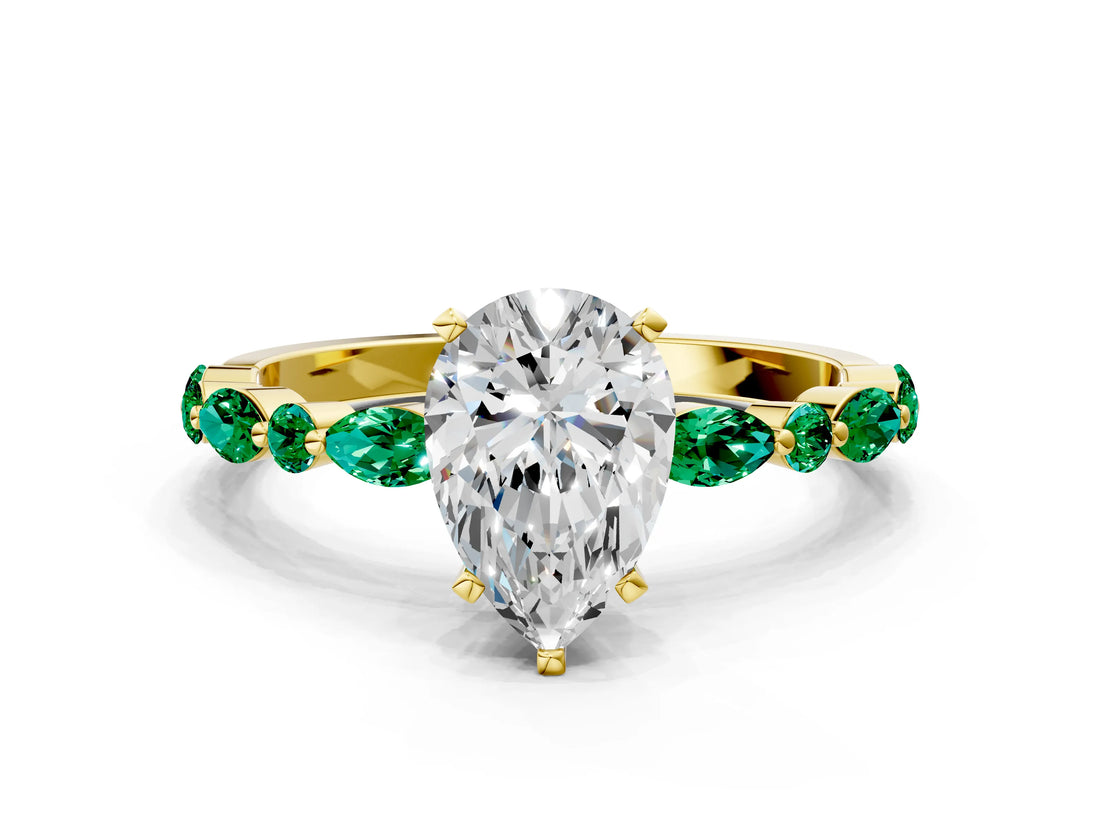 Yellow gold Pear Cut Diamond Ring with Marquise and Round with Emerald side stone Side Stones and Four-Prong Setting_48