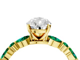 Yellow gold Pear Cut Diamond Ring with Marquise and Round with Emerald side stone Side Stones and Four-Prong Setting_52