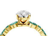 Yellow gold Pear Cut Diamond Ring with Marquise and Round with Green Sapphire side stone Side Stones and Four-Prong Setting_16