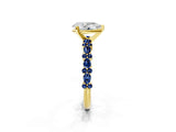 Yellow gold Pear Cut Diamond Side Stone Solitaire Ring with Round with Blue Sapphire side stone and Four-Prong Setting_1