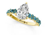 Yellow gold Pear Cut Diamond Side Stone Solitaire Ring with Round with Blue Topaz side stone and Four-Prong Setting_1
