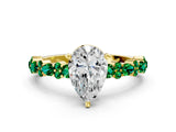 Yellow gold Pear Cut Diamond Side Stone Solitaire Ring with Round with Emerald side stone and Four-Prong Setting