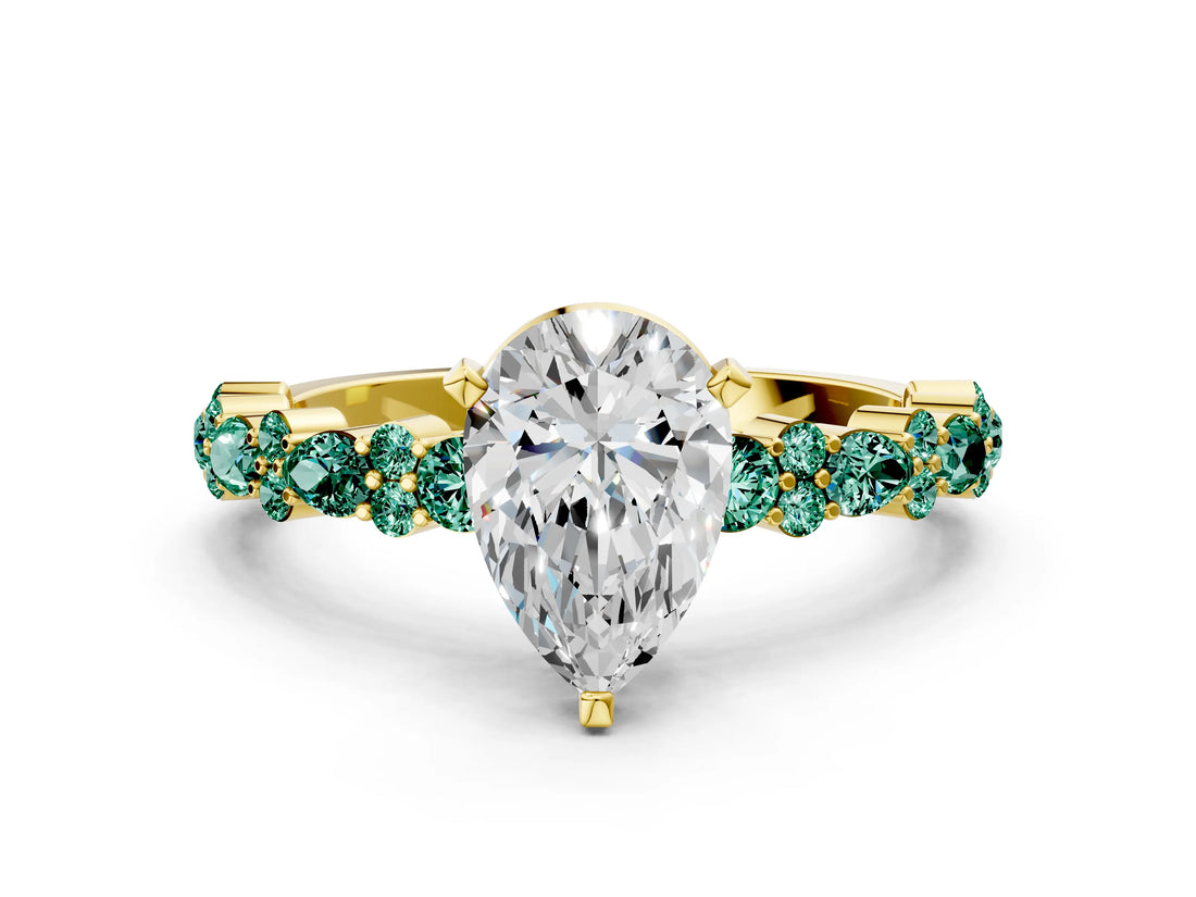 Yellow gold Pear Cut Diamond Side Stone Solitaire Ring with Round with Green Sapphire side stone and Four-Prong Setting