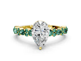 Yellow gold Pear Cut Diamond Side Stone Solitaire Ring with Round with Green Sapphire side stone and Four-Prong Setting