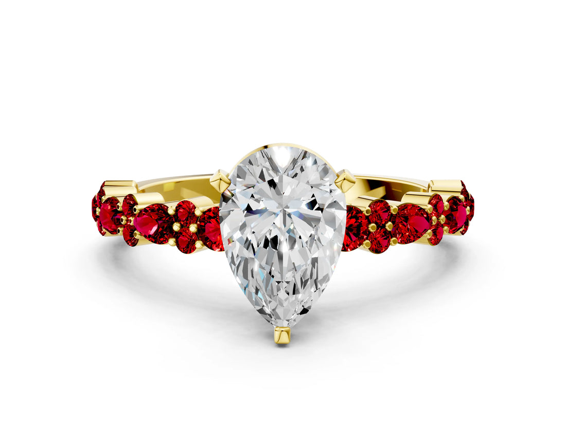 Yellow gold Pear Cut Diamond Side Stone Solitaire Ring with Round with Ruby side stone and Four-Prong Setting