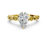 Yellow gold Pear Cut Diamond Side Stone Solitaire Ring with Round with Yellow Sapphire side stone and Four-Prong Setting