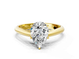 Yellow gold Pear Cut Diamond Solitaire Engagement Ring with Cathedral Setting and Four-Prong Mount_260