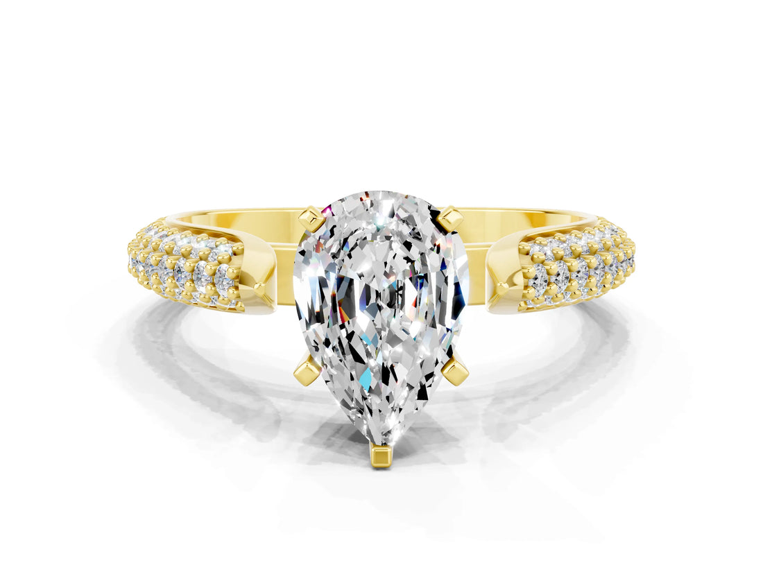Yellow gold Pear Cut Diamond Solitaire Engagement Ring with Pavé Band and Four-Prong Setting