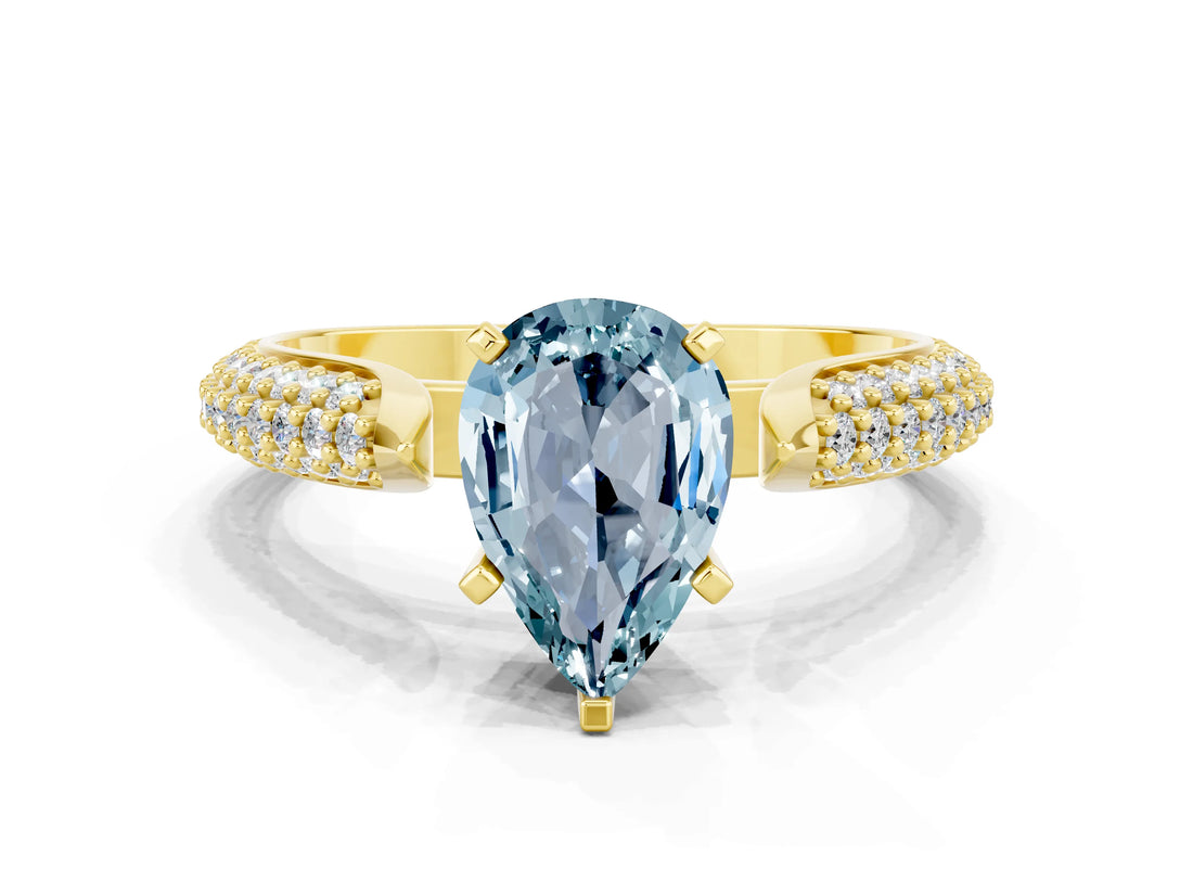 Yellow gold Pear Cut Diamond Solitaire Engagement Ring with Pavé Band and Four-Prong Setting