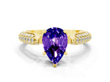 Yellow gold Pear Cut Diamond Solitaire Engagement Ring with Pavé Band and Four-Prong Setting