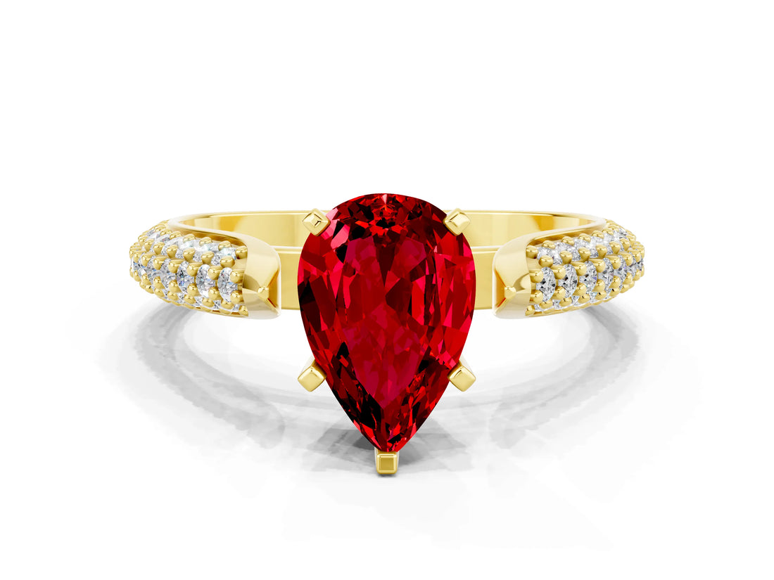 Yellow gold Pear Cut Diamond Solitaire Engagement Ring with Pavé Band and Four-Prong Setting