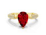 Yellow gold Pear Cut Diamond Solitaire Engagement Ring with Pavé Band and Four-Prong Setting