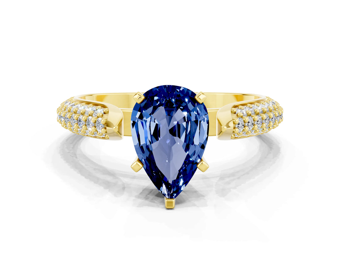 Yellow gold Pear Cut Diamond Solitaire Engagement Ring with Pavé Band and Four-Prong Setting