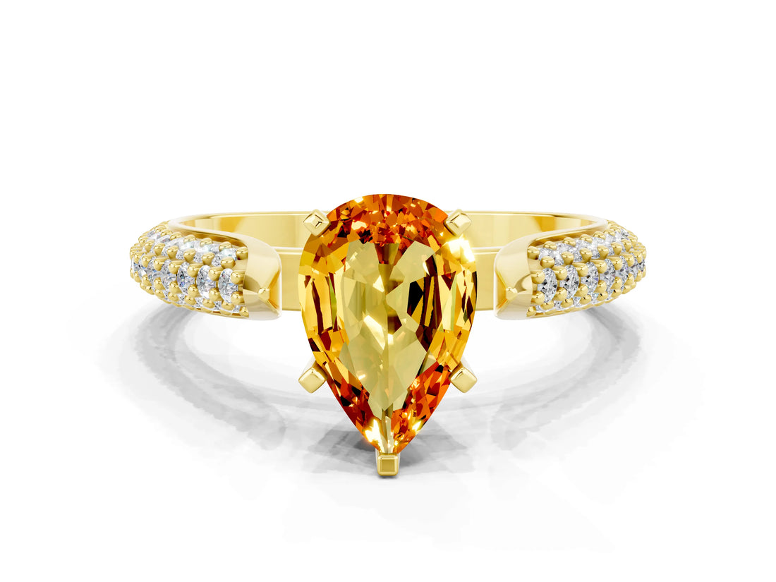 Yellow gold Pear Cut Diamond Solitaire Engagement Ring with Pavé Band and Four-Prong Setting