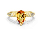 Yellow gold Pear Cut Diamond Solitaire Engagement Ring with Pavé Band and Four-Prong Setting