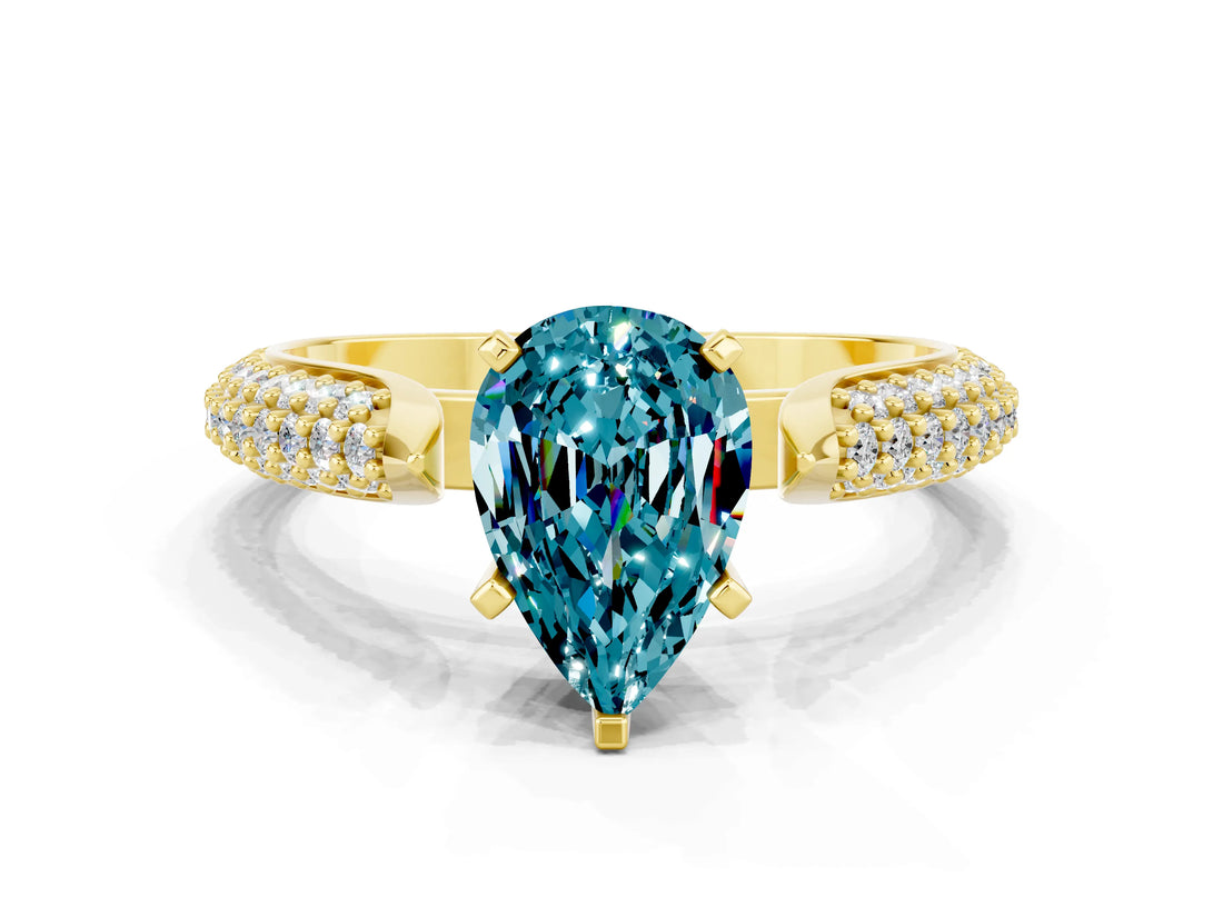 Yellow gold Pear Cut Diamond Solitaire Engagement Ring with Pavé Band and Four-Prong Setting