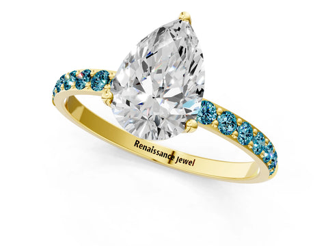 Yellow gold Pear Cut Diamond Solitaire Engagement Ring with Round with Blue Topaz side stone Pavé Band and Prong Setting_1