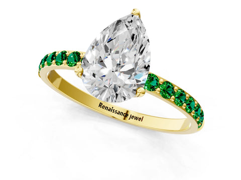 Yellow gold Pear Cut Diamond Solitaire Engagement Ring with Round with Emerald side stone Pavé Band and Prong Setting_1