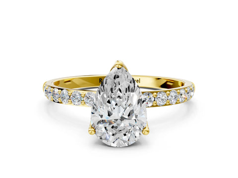 Yellow gold Pear Cut Diamond Solitaire Engagement Ring with Round with Moissanite side stone Pavé Band and Prong Setting