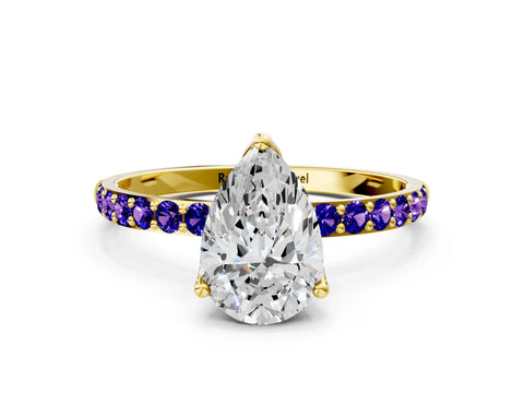 Yellow gold Pear Cut Diamond Solitaire Engagement Ring with Round with Tanzanite side stone Pavé Band and Prong Setting