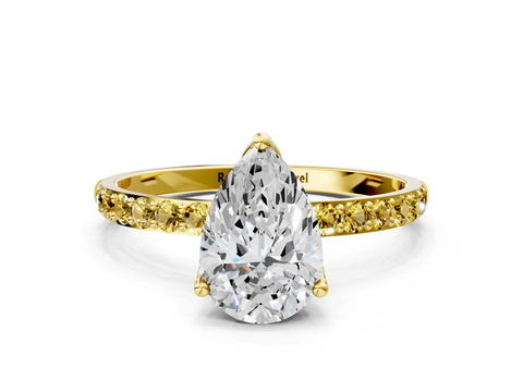 Yellow gold Pear Cut Diamond Solitaire Engagement Ring with Round with Yellow Sapphire side stone Pavé Band and Prong Setting
