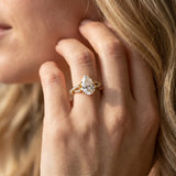 Yellow gold Pear Cut Diamond Solitaire Engagement Ring with Twisted Pavé Band and Four-Prong Setting_15