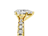 Yellow gold Pear Cut Diamond Solitaire Pavé Engagement Ring with Round Band and Prong Setting_69