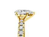 Yellow gold Pear Cut Diamond Solitaire Pavé Engagement Ring with Round Band and Prong Setting_87