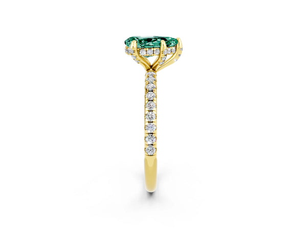 Yellow gold Pear Cut Green Sapphire Hidden Halo Engagement Ring with Round Pavé Band and Prong Setting