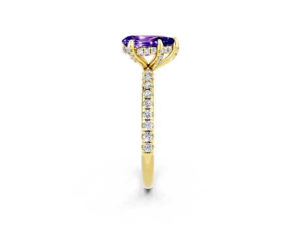 Yellow gold Pear Cut Tanzanite Hidden Halo Engagement Ring with Round Pavé Band and Prong Setting