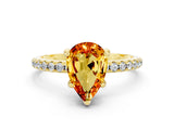 Yellow gold Pear Cut Diamond Solitaire Ring with Four-Prong Setting and Pavé Band