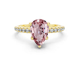 Yellow gold Pear Cut Diamond Solitaire Ring with Four-Prong Setting and Pavé Band