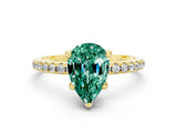 Yellow gold Pear Cut Diamond Solitaire Ring with Four-Prong Setting and Pavé Band
