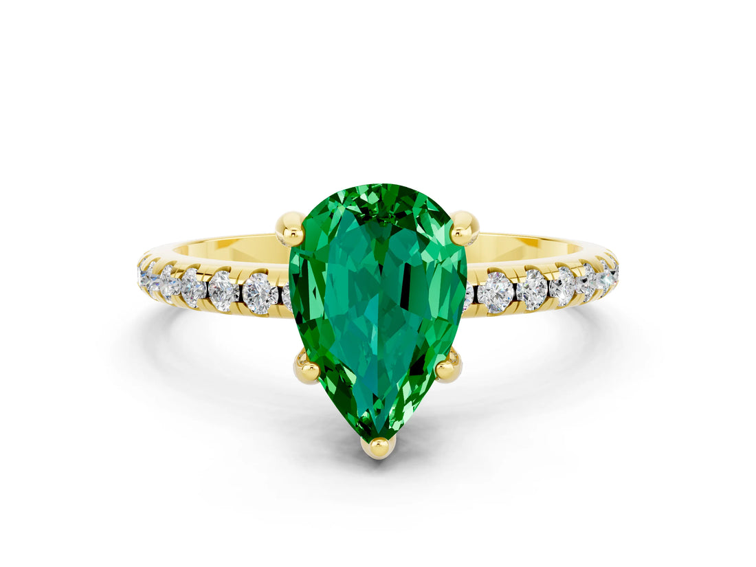 Yellow gold Pear Cut Diamond Solitaire Ring with Four-Prong Setting and Pavé Band