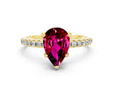 Yellow gold Pear Cut Diamond Solitaire Ring with Four-Prong Setting and Pavé Band