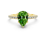 Yellow gold Pear Cut Diamond Solitaire Ring with Four-Prong Setting and Pavé Band
