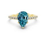Yellow gold Pear Cut Diamond Solitaire Ring with Four-Prong Setting and Pavé Band