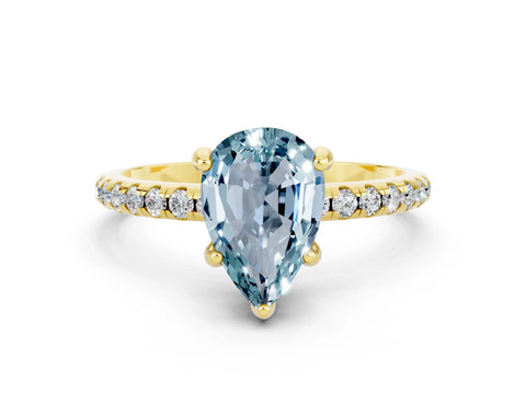 Yellow gold Pear Cut Diamond Solitaire Ring with Four-Prong Setting and Pavé Band