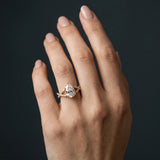 Yellow gold Pear Cut Diamond Solitaire Ring with Four-Prong Setting and Twisted Pavé Band_56