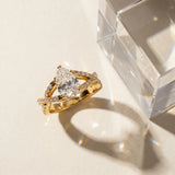 Yellow gold Pear Cut Diamond Solitaire Ring with Four-Prong Setting and Twisted Pavé Band_59